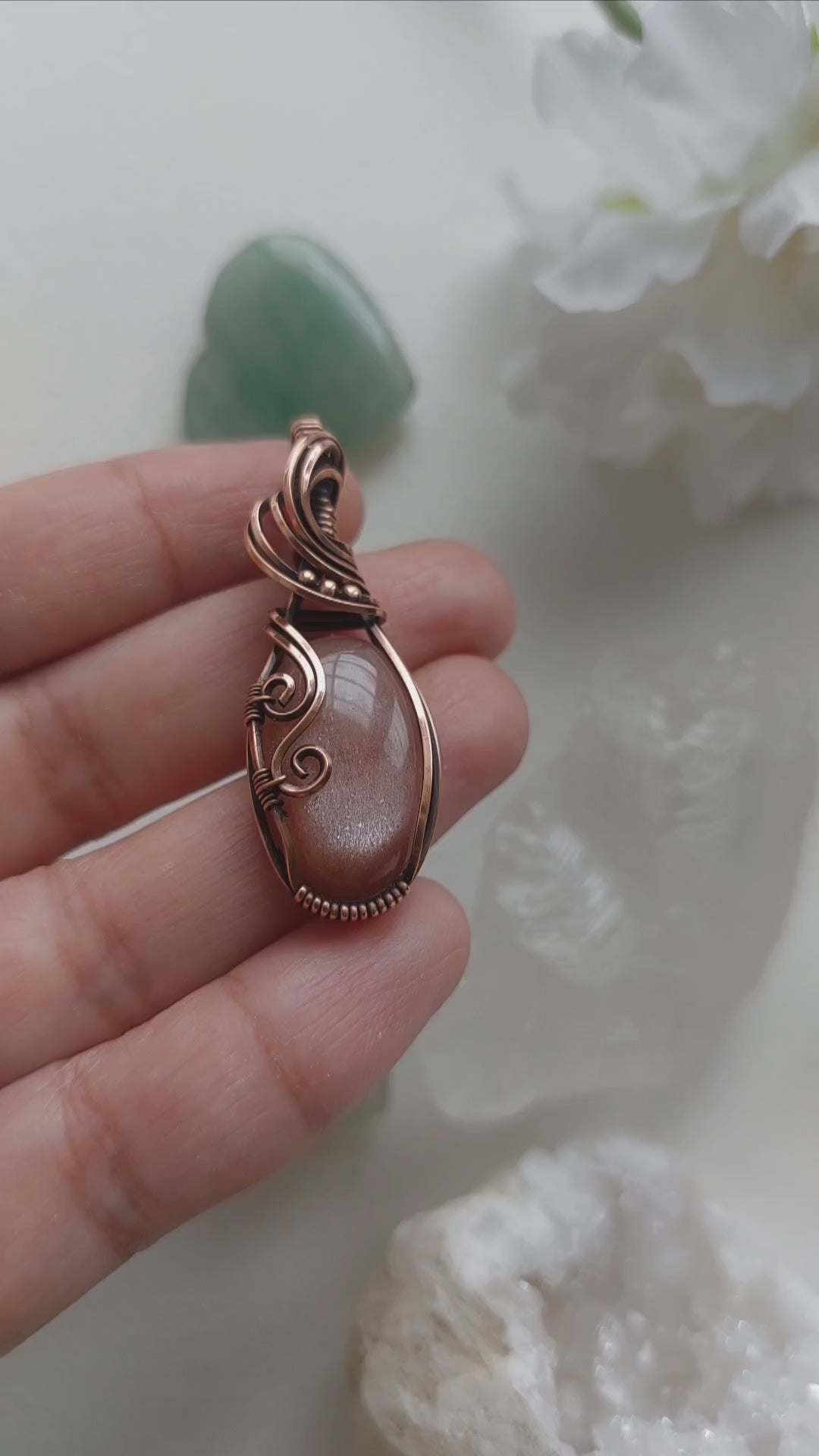 Peach moonstone with sunstone inclusions- wire wrapped copper handmade crystal pendant