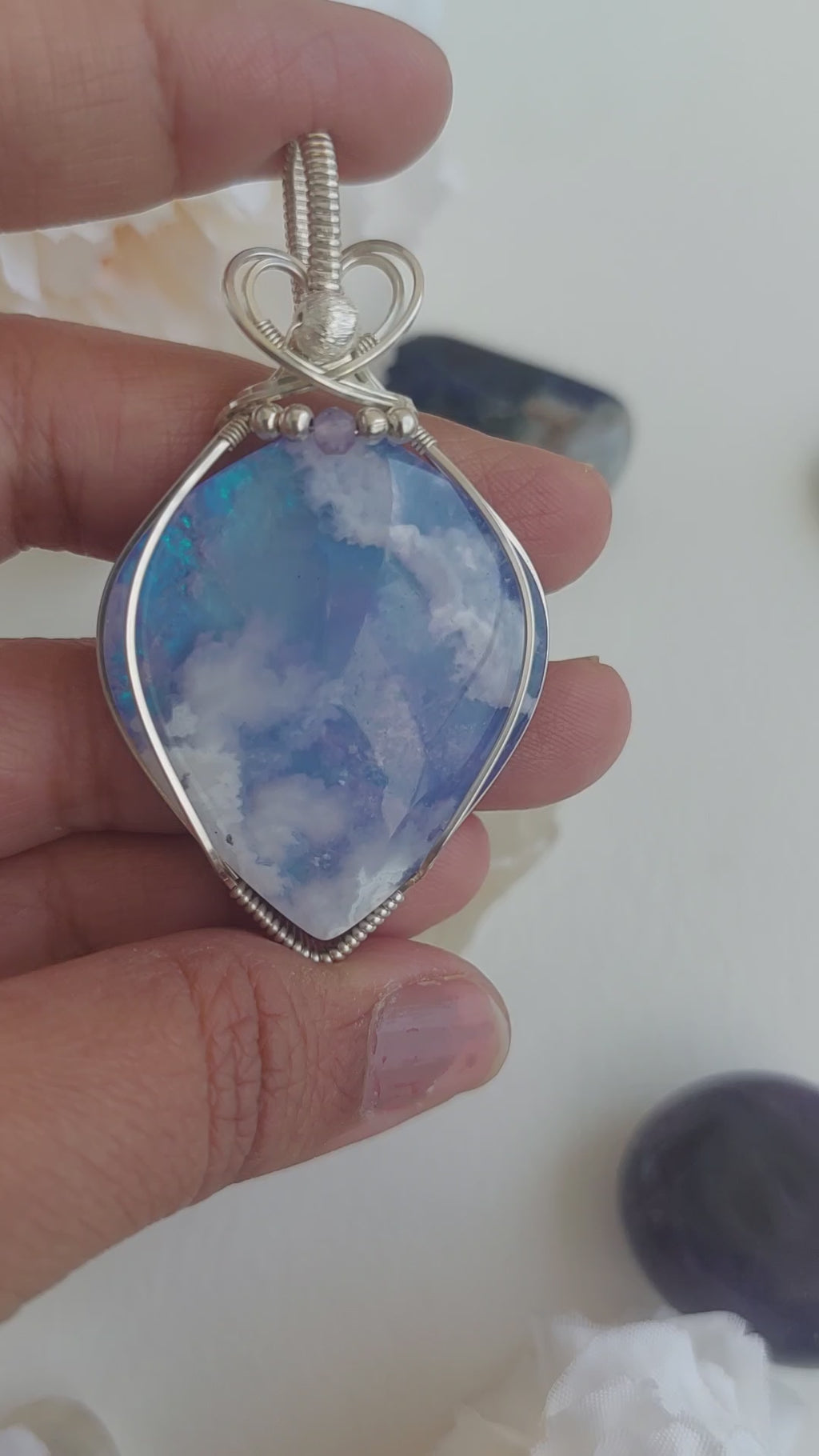 A piece of sky- aurora effect- plume agate doublet sterling silver wire wrapped handmade pendant