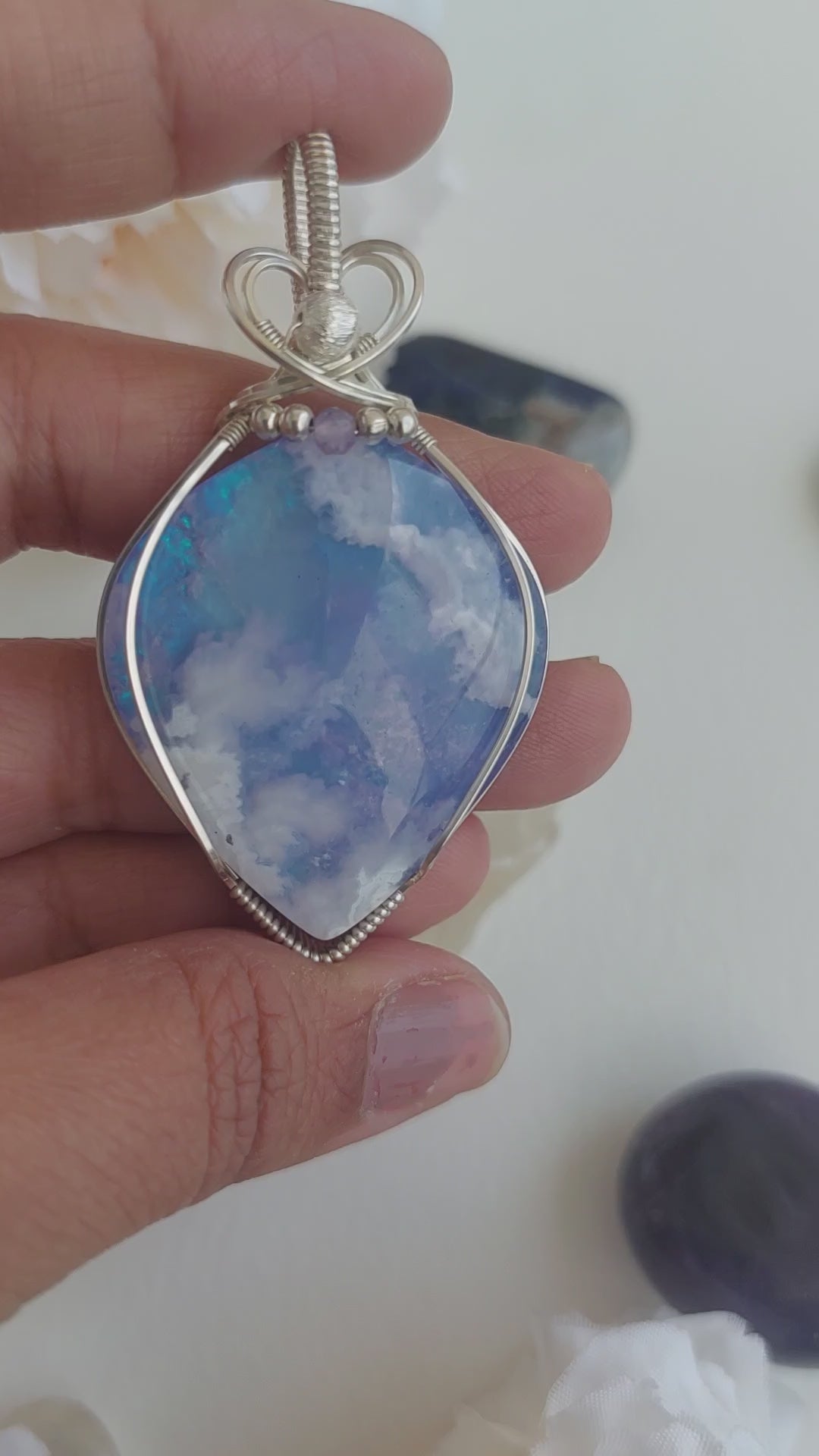 A piece of sky- aurora effect- plume agate doublet sterling silver wire wrapped handmade pendant