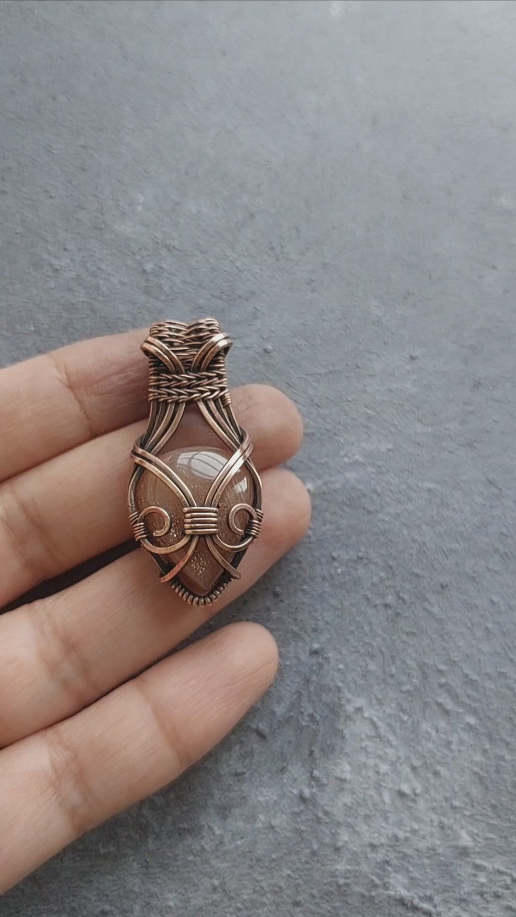 Peach moonstone handmade copper wire wrapped copper pendant