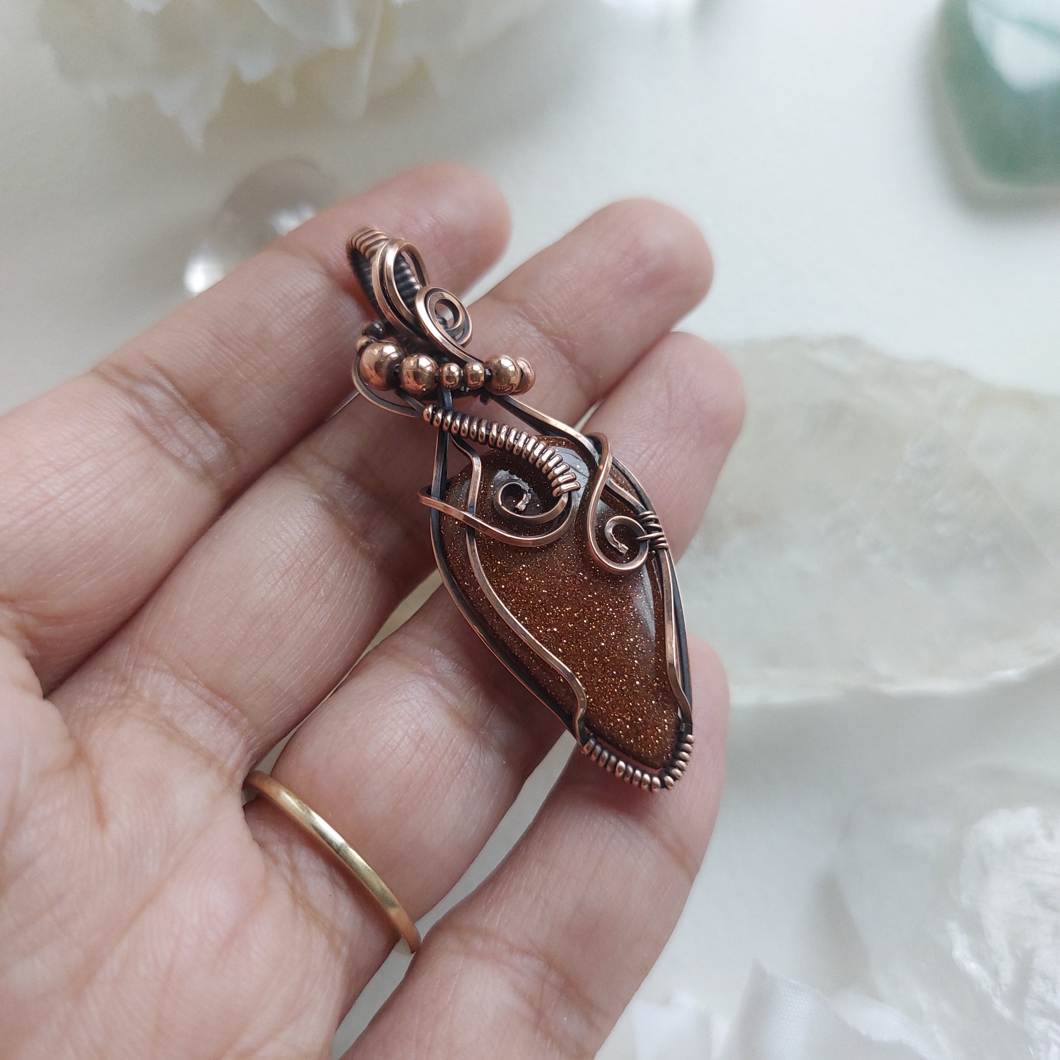 Goldstone (manmade stone) Copper Wire Wrapped pendant
