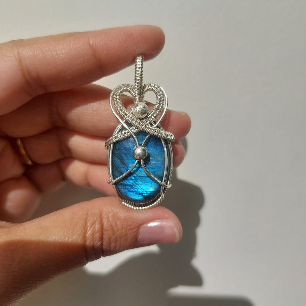Blue flash labradorite wire wrapped handmade sterling silver pendant