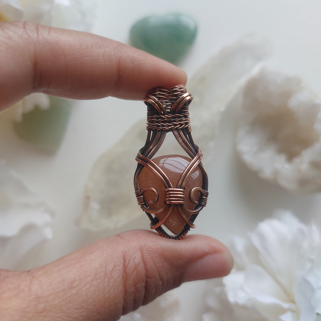 Peach moonstone handmade copper wire wrapped copper pendant