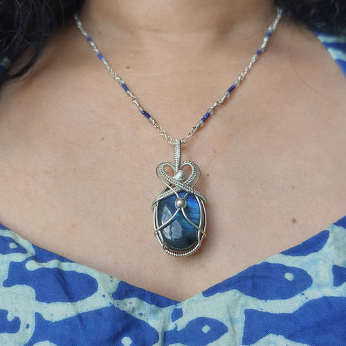Blue flash labradorite wire wrapped handmade sterling silver pendant