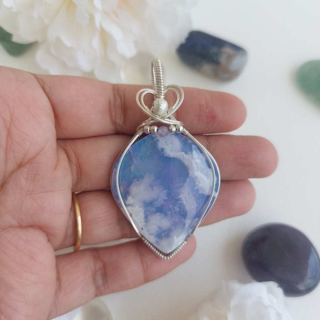A piece of sky- aurora effect- plume agate doublet sterling silver wire wrapped handmade pendant