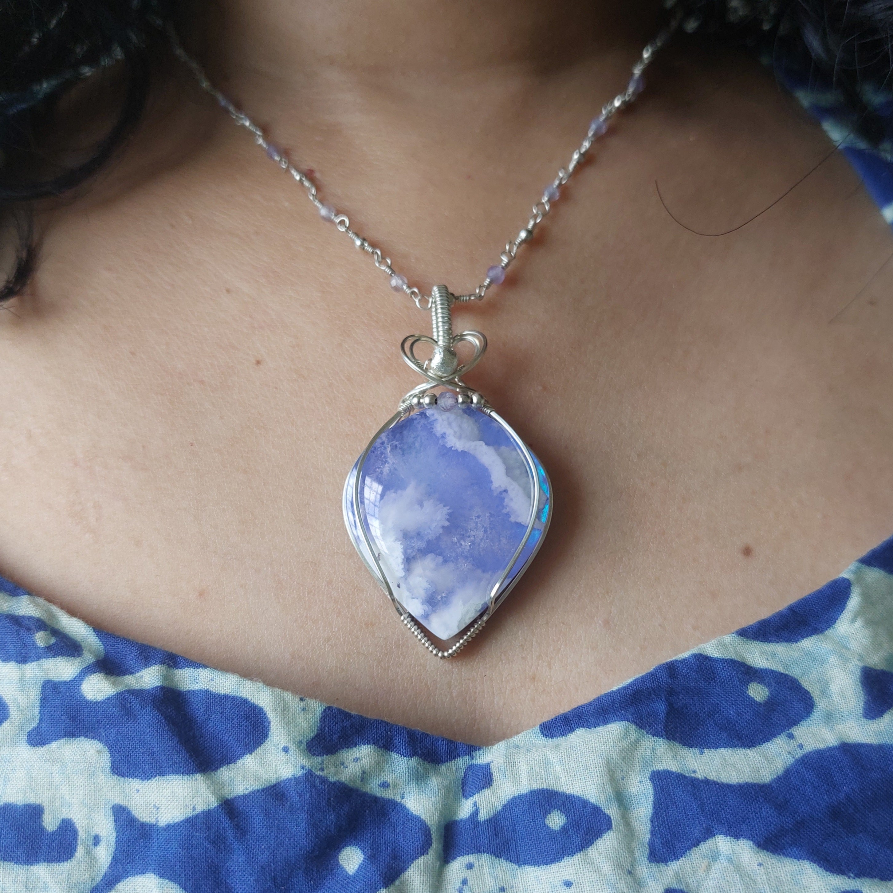 A piece of sky- aurora effect- plume agate doublet sterling silver wire wrapped handmade pendant
