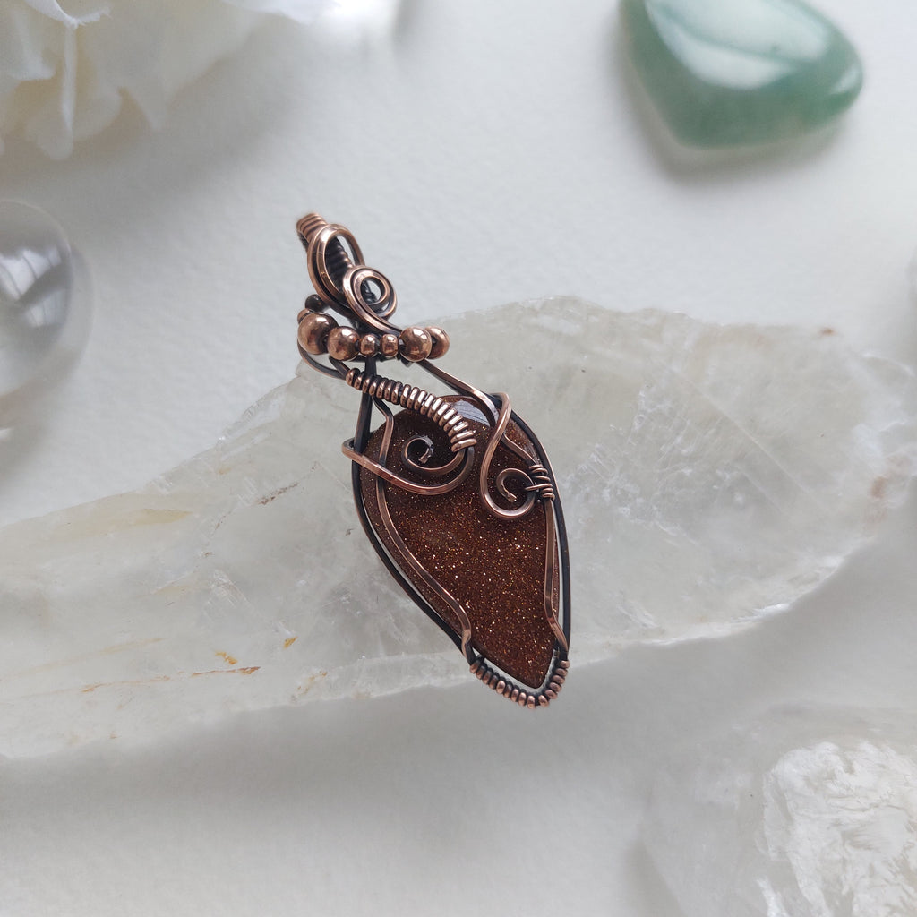 Goldstone (manmade stone) Copper Wire Wrapped pendant