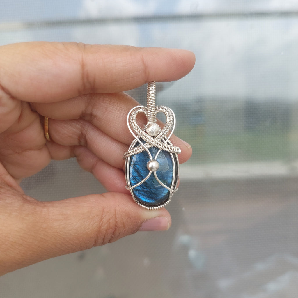Blue flash labradorite wire wrapped handmade sterling silver pendant