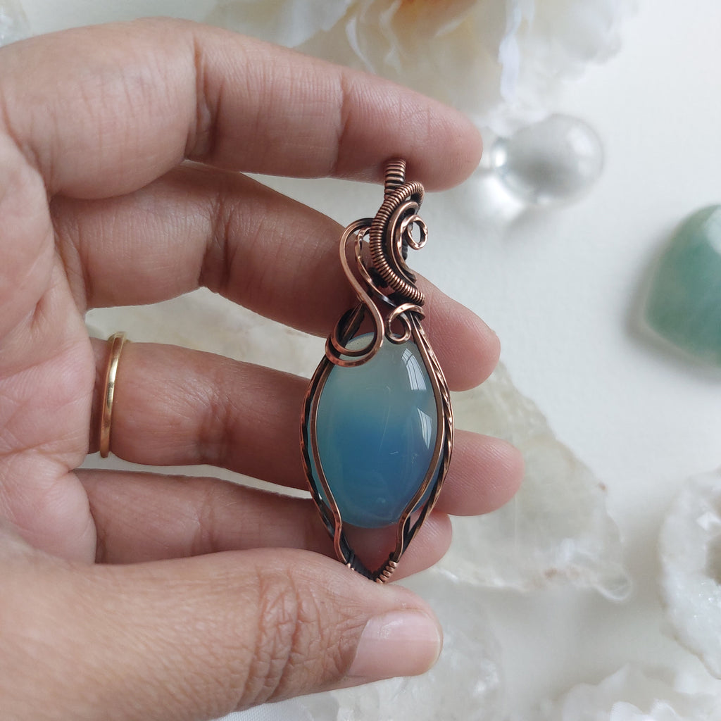Handmade Blue Chalcedony Pendant in Copper – Healing Gemstone Necklace for Peace & Balance